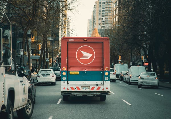 Canada Post delivery truck on the road